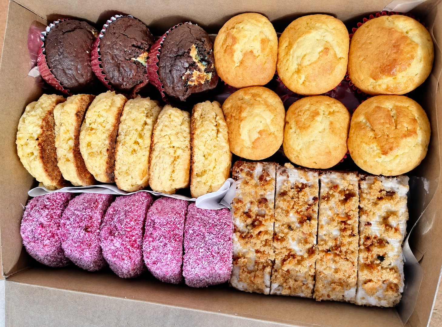 A variety box of freshly baked treats